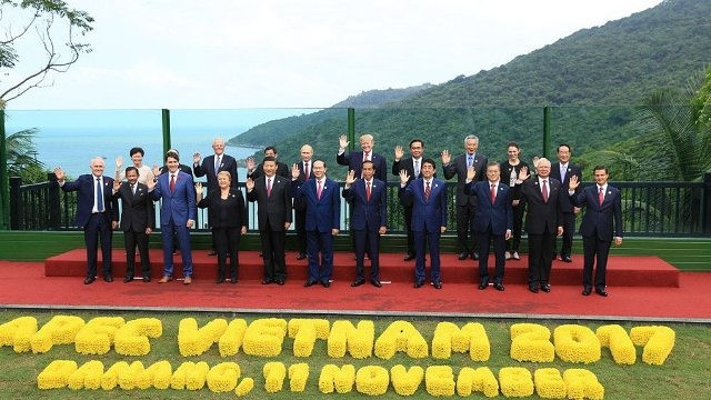 Photo de famille entre les dirigeants des membres de l’APEC. Photo : VGP.