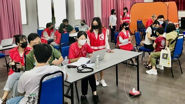 La consultation médicale gratuite pour les Vietnamiens en Malaisie. Photo: baoquocte.vn
