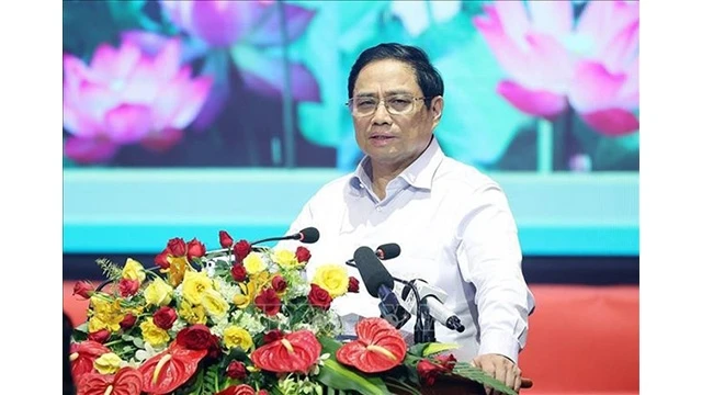 Le Premier ministre vietnamien, Pham Minh Chinh, lors de la rencontre en l’honneur du 75e anniversaire de la Journée des invalides de guerre et des martyrs, à Hô Chi Minh-Ville, le 27 juillet. Photo : VNA.