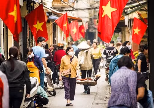 Les Vietnamiens ressentent les « fruits » de la lutte anti-épidémique. Photo : THPL.