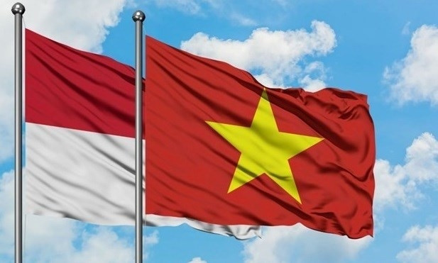 Les drapeaux nationaux des deux pays. Photo : Katadata.