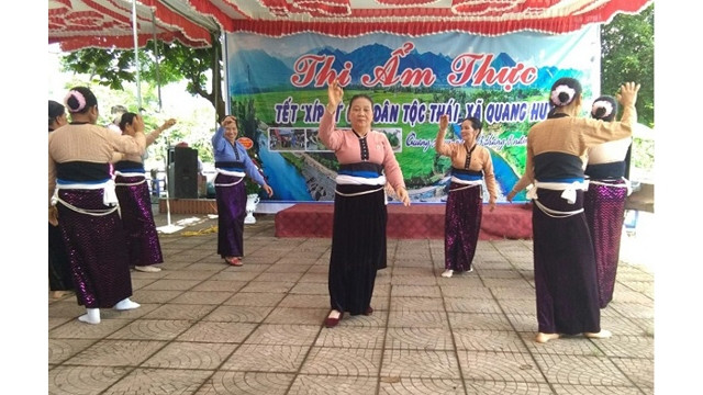 Le concours culinaire au jour du Têt " xip xi " des Thai bancs dans la commune de Quang Huy, district de Phu Yên, province de Son La. Photo : https://baotainguyenmoitruong.vn