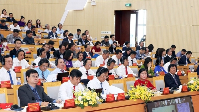 Lors de la conférence sur la promotion des investissements avec des investisseurs de Singapour, qui s’est tenue le 5 juillet.Photo: Bao Binh Phuoc