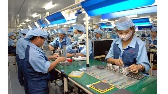 Selon Banque nationale du Qatar, l’économie vietnamienne devrait connaître une croissance économique de 7% en 2016.Photo: VNA.