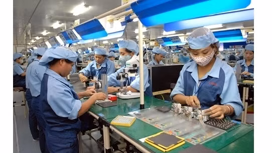 Selon Banque nationale du Qatar, l’économie vietnamienne devrait connaître une croissance économique de 7% en 2016.Photo: VNA.