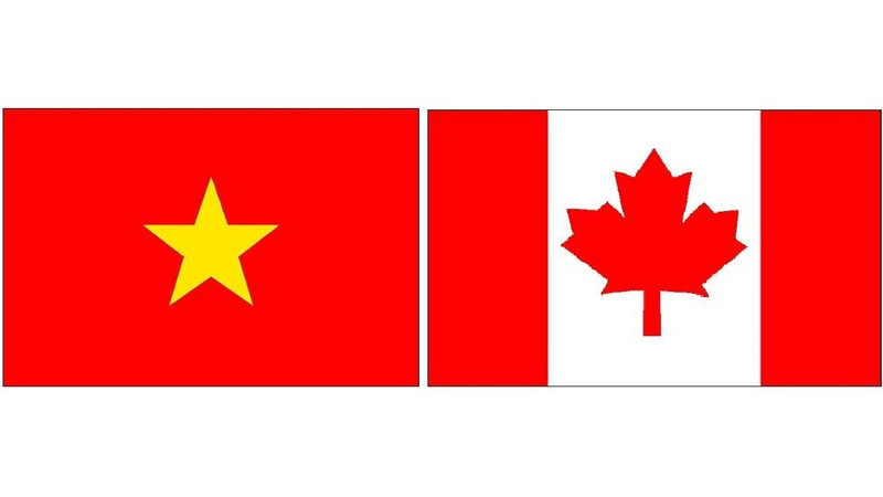 Drapeaux du Vietnam et du Canada. Photo: NDEL.