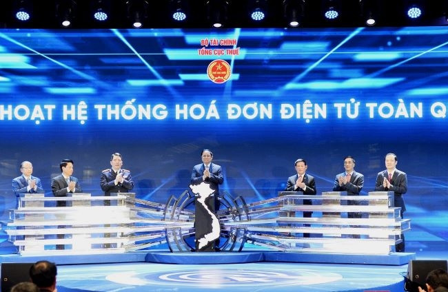 Le PM Pham Minh Chinh assiste à la cérémonie. Photo: Tran Hai/NDEL