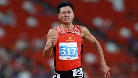 L’athlète Lê Trong Hinh sur la course de 200m. Photo: Hai Dang/NDEL.