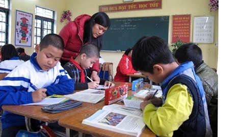 Ce programme a permis d'atteindre de pleins résultats en termes de scolarisation des enfants de moins de 6 ans à l'école. Photo: VNA.