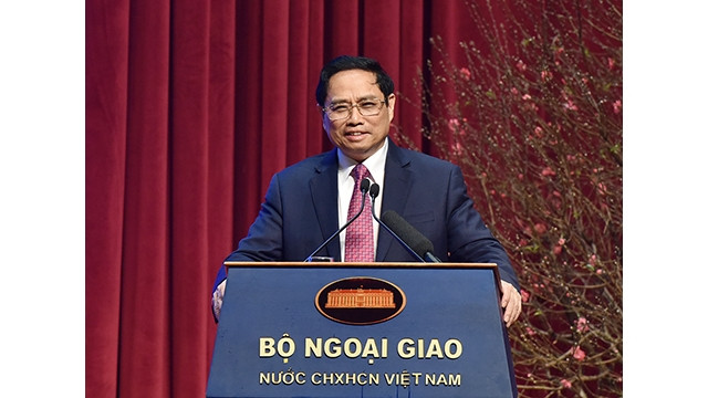 Le Premier ministre Pham Minh Chinh prend la parole à la conférence. Photo : Trân Hai/NDEL
