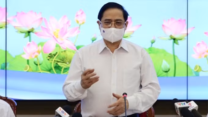 Le Premier ministre Pham Minh Chinh prend la parole lors de la séance de travail avec les autorités de Hô Chi Minh-Ville. Photo : TTO.