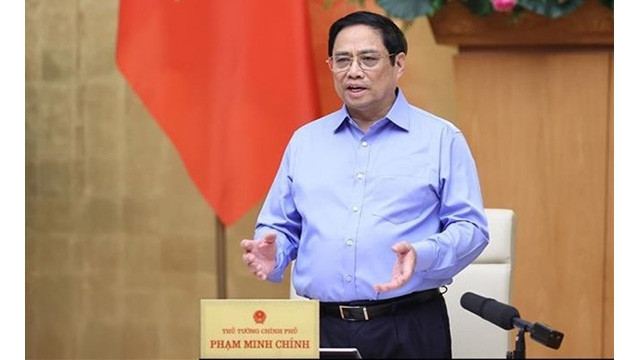 Le Premier ministre Pham Minh Chinh lors de la séance thématique du gouvernement, à Hanoi, le 24 août. Photo : VNA.