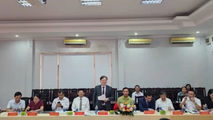 Le président de l’Union des Associations des Sciences et des Techniques du Vietnam (VUSTA), Phan Xuan Dung, a pris la parole lors de la séance de travail. Photo : VUSTA.