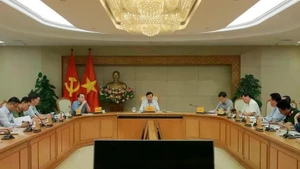 Vue de la réunion du Comité national de sécurité de l’aviation civile, à Hanoi, le 5 juin. Photo : VNA.