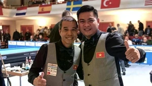 Trân Quyêt Chiên (à gauche) et Nguyên Trân Thanh Tu ont aidé le Vietnam à remporter le championnat du monde. Photo : DBU