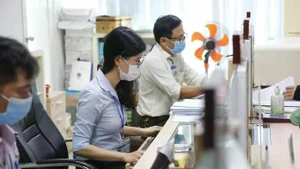 Le Vietnam prépare une réforme pour recruter experts et entrepreneurs dans le secteur public. Photo: nld.com.vn