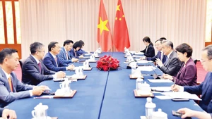 Des diplomates vietnamiens et chinois se sont entretenus au Yunnan, en Chine. Photo : Ambassade du Vietnam en Chine.