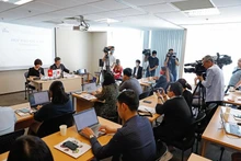 Lors de la conférence de presse tenue le 12 octobre à Hanoi. Photo: NDEL