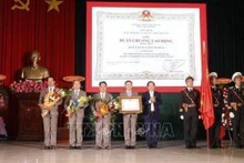 Remise de l’Ordre du Travail de première classe au district de Truong Sa. Photo: VNA