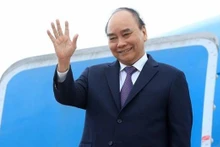 Le Président Nguyên Xuân Phuc à l'aéroport international Soekarno Hatta à Jakarta. . Photo : VNA.