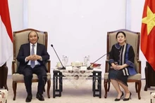 Le président Nguyên Xuân Phuc et la présidente de la Chambre des représentants d'Indonésie, Puan Maharani. Photo: VNA