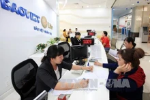 Le marché d'assurance s'oriente vers le développement durable et intégral. Photo: VNA