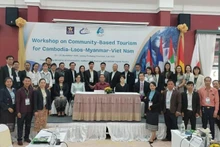 Les participants à la conférence. Photo : tapchilaoviet.org