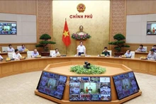  Le Vice-Premier ministre Trân Luu Quang préside la 7e réunion du Comité national de pilotage de la lutte contre la pêche INN. Photo : VNA.