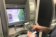 Le PM demande des mesures pour répondre aux besoins de paiement des organisations de crédit avant et pendant le Nouvel An et le Nouvel An lunaire. Photo : VNA