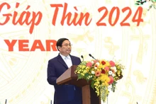 Le Premier ministre vietnamien Pham Minh Chinh prend la parole lors de la réception. Photo : NDEL.