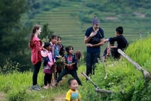 Des traits culturels des minorités ethniques régions montagneuses du Nord séduisent des touristes étrangers. Photo: VNA 