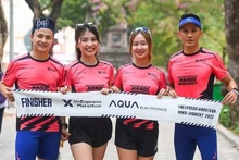 La course nocturne VnExpress Marathon Midnight 2022 attire 10 000 coureurs. Photo : Comité d'organisation