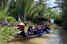Promenade en bateau à Tiên Giang. Photo : VOV.