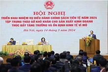 Le Premier ministre Pham Minh Chinh s'exprime lors de la conférence. Photo : VNA.