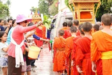  Le Boun Pi May lao est l’occasion de multiples réjouissances qui se déroulent chaque année au mois d’avril. Photo : tapchilaoviet.org