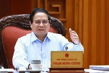 Le Premier ministre Pham Minh Chinh s’exprime lors de la réunion, à Hanoi, le 22 avril. Photo : VNA. 