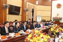 Séance de travail entre les autorités de la province de Thanh Hoa et le ministère de l’Intérieur du Laos. Photo : Thoidai.com.vn