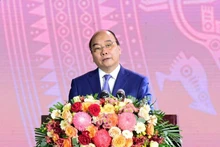 Le Président Nguyên Xuân Phuc prend la parole lors de la cérémonie. Photo : NDEL.