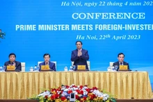 Le Premier ministre Pham Minh Chinh préside une réunion avec des investisseurs étrangers. Photo : VnEconomy.vn