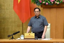 Le Premier ministre Pham Minh Chinh à la réunion. photo : VNA.