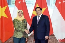 Le Premier ministre Pham Minh Chinh et la Présidente singapourienne Halimah Yacob, en visite d’État au Vietnam du 16 au 20 octobre.