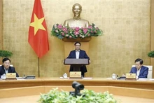 Le Premier ministre Pham Minh Chinh lors de la séance du matin 1er décembre de la réunion périodique de novembre du gouvernement. Photo : VNA.
