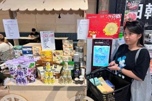 Le café de marque Meet More a été présenté dans un supermarché en Australie lors du récent Nouvel An et a reçu des réponses positives, permettant à la société de recevoir de grosses des commandes pour 2024. Photo : congthuong. 