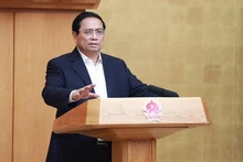 Le Premier ministre Pham Minh Chinh lors de la réunion thématique du gouvernement sur l’élaboration des lois. Photo : VNA.