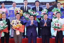 Le Premier ministre vietnamien, Pham Minh Chinh (au milieu, au 1er rang), lors de l'événement. Photo : VNA.
