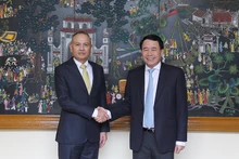 Le général de division Lê Quôc Hùng, vice-ministre vietnamien de la Sécurité publique, et le général Roy Inkapairoj, commandant en chef adjoint de la Police royale thaïlandaise. Photo : CAND.