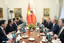 Entrevue entre le Premier ministre Pham Minh Chinh et le président polonais Andrzej Duda au palais présidentiel, à Varsovie. Photo: VNA
