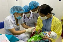 La population du Vietnam atteignant 100 millions d'habitants est une étape importante et impressionnante dans le développement du pays. Photo : NDEL.