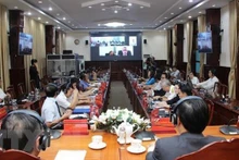 La conférence de promotion des investissements entre la province vietnamienne de Binh Phuoc et les entreprises italiennes. Photo : VNA