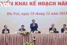 Le Premier ministre Pham Minh Chinh (debout) à la conférence. Photo : VOV.